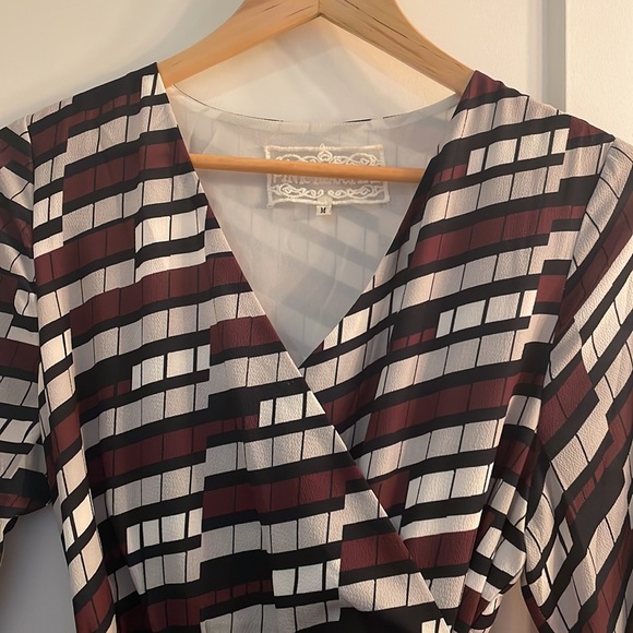 Patterned wrap dress. Layered, flowy, and luxurious. - Picture 1 of 6